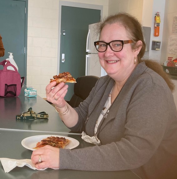 Dalhousie Staff Member Enjoys lunch of Pizza from Restigouche Branch of the New Brunswick Society of Retired Teachers